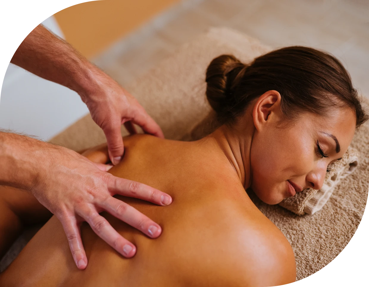 Woman receiving a relaxing back massage